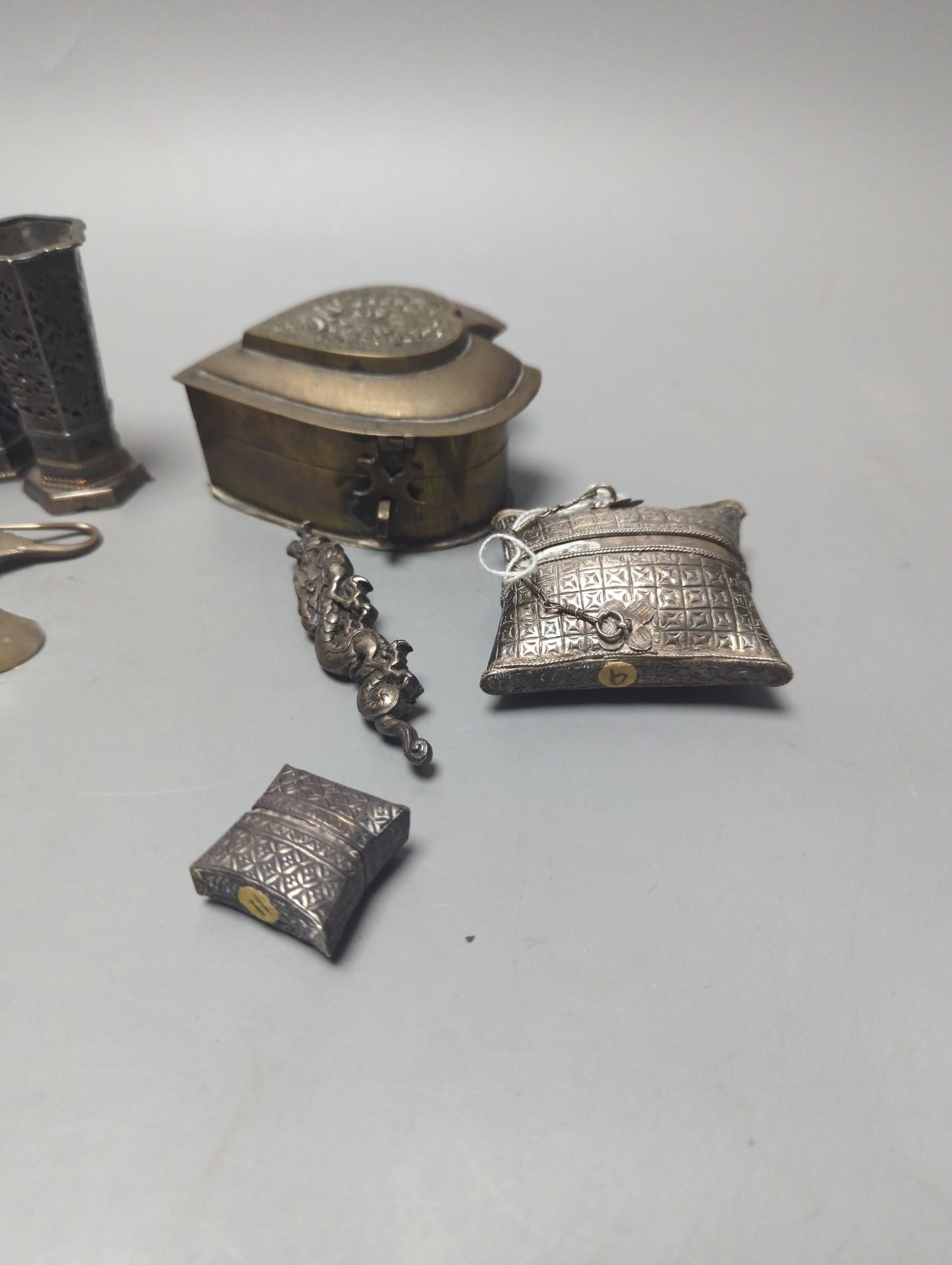 A group of Asian and other small collectables, white metal, brass etc